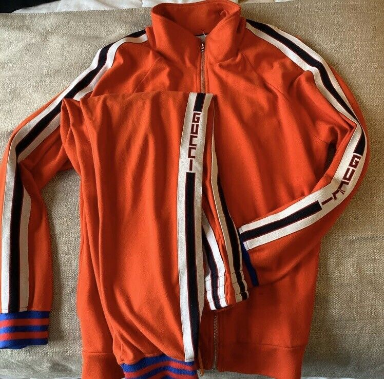 red designer tracksuit